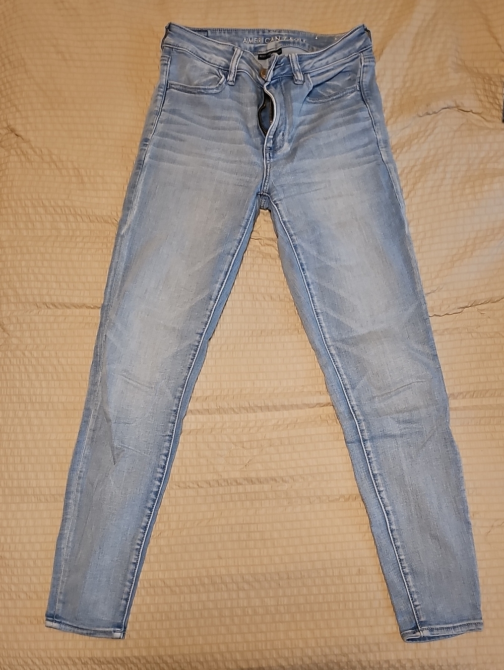 AE Skinny Jeans - Faded Light Blue Wash